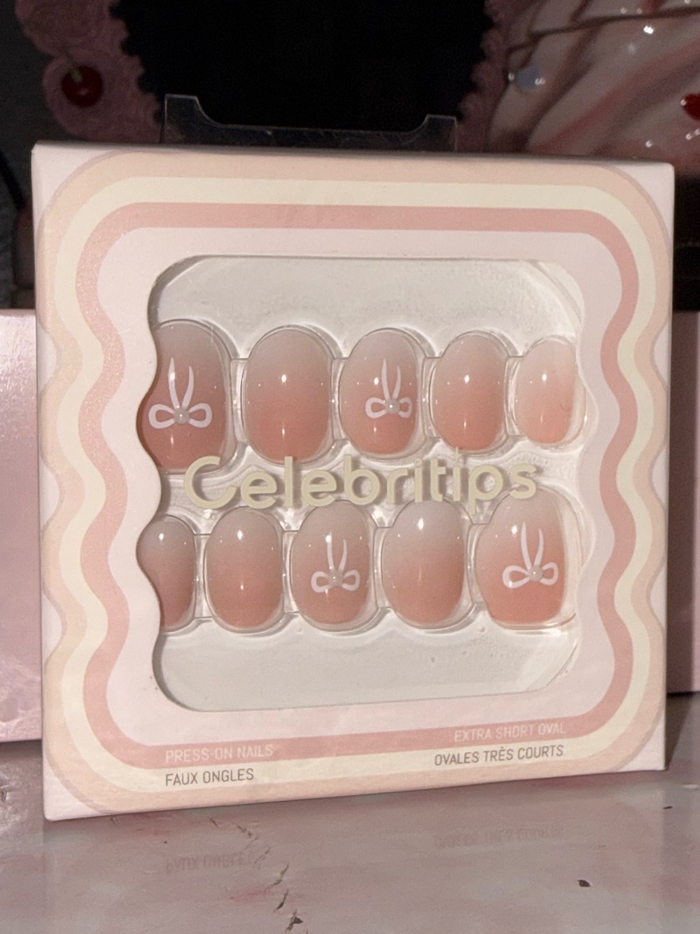 Celebritips Peachy Nude Press-On Nail Set with White Bow Accent